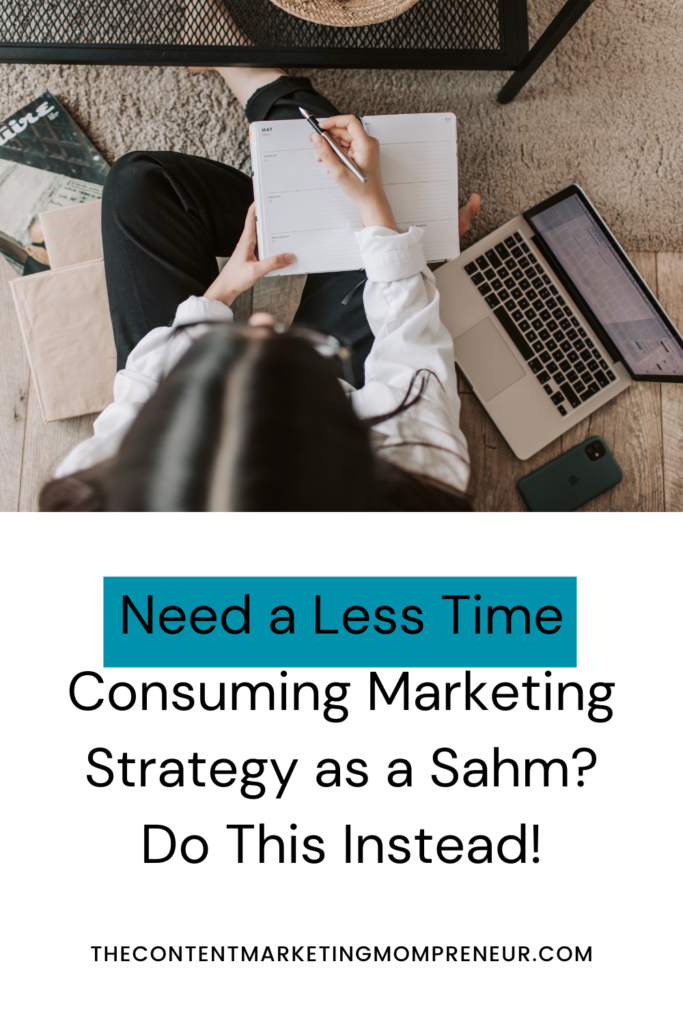 Image of dark-haired woman sitting on floor with laptop and notebook and title Need a less time-consuming marketing strategy as a Sahm? Do this instead! thecontentmarketingmompreneur.com/blog